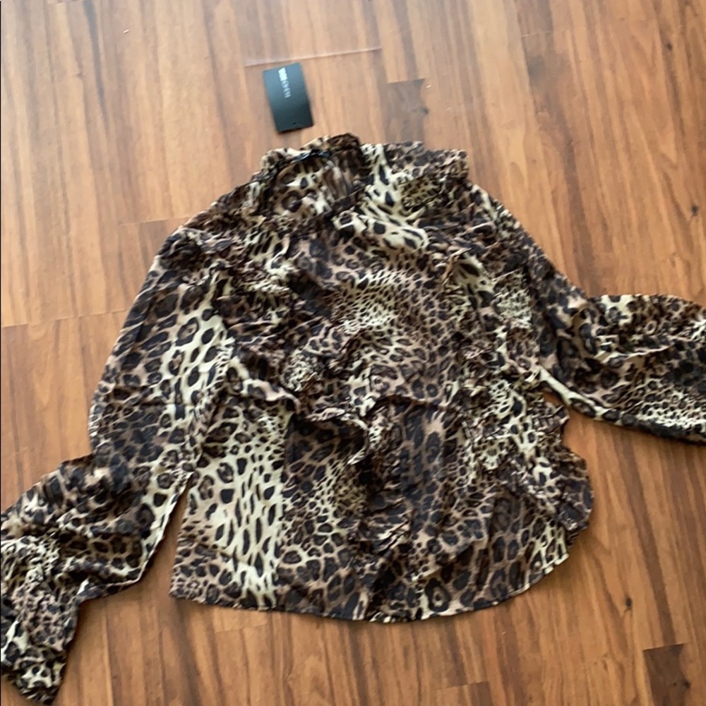 Leopard-print blouse.